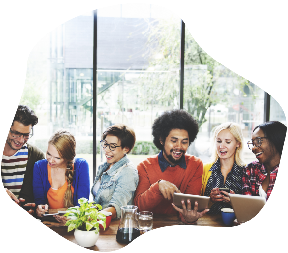 People laughing at a work lunch