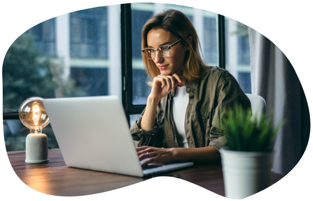 A woman working at her laptop